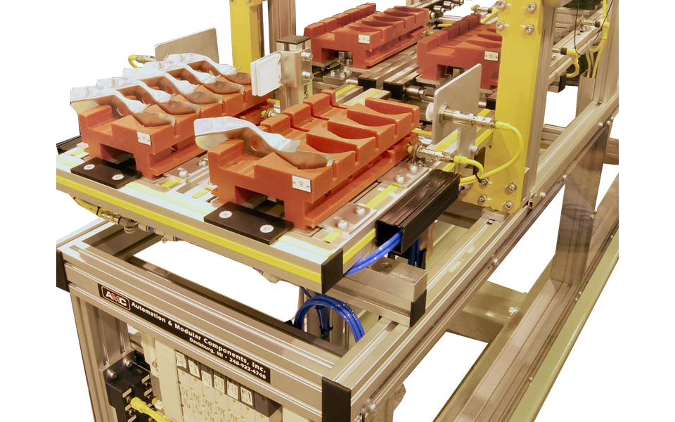 Compact modular conveyor integrated with CNC machine for precision chip handling and part transfer